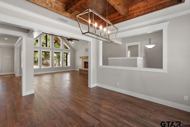 12090 Hackberry Holw, Tyler, TX 75706 - unfurnished dining area featuring dark wood-type flooring, baseboards, ceiling fan with notable chandelier, and visible vents