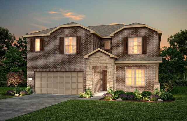 traditional home featuring brick siding, an attached garage, and concrete driveway