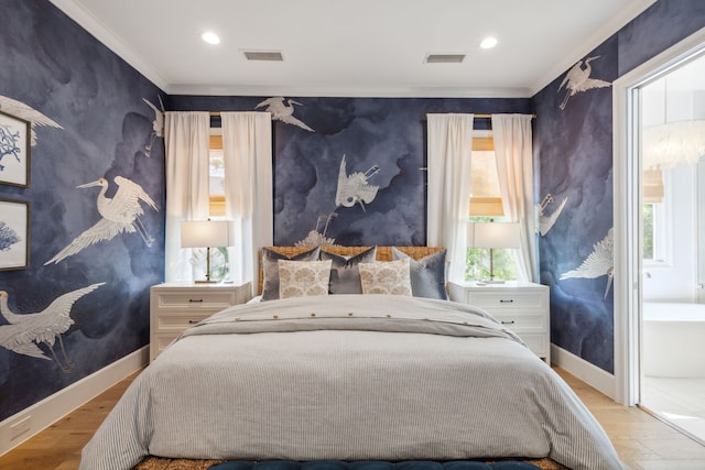 bedroom with crown molding, baseboards, wallpapered walls, wood finished floors, and visible vents