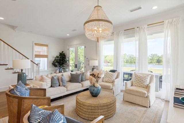 living room with stairs, recessed lighting, a chandelier, and visible vents