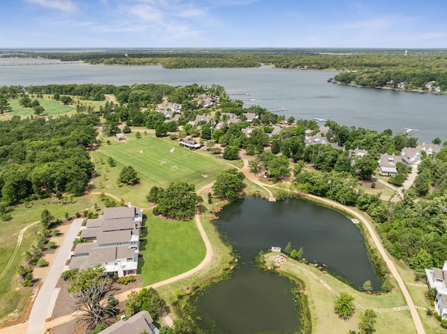 birds eye view of property featuring a water view