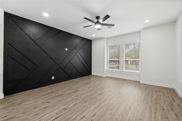 unfurnished room featuring visible vents, baseboards, light wood-type flooring, recessed lighting, and a ceiling fan
