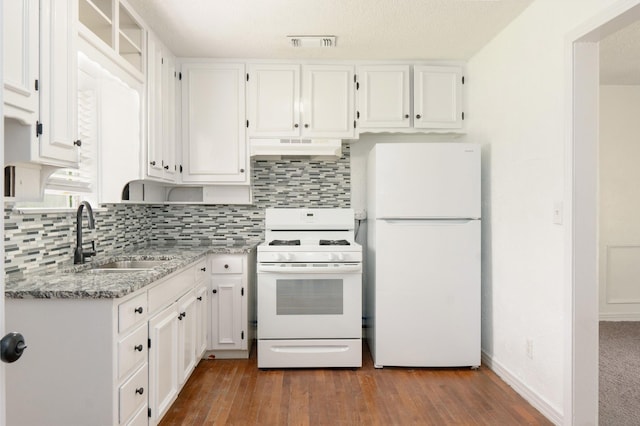 5524 Korth St, Sansom Park, TX 76114 - kitchen featuring white appliances, a sink, under cabinet range hood, and white cabinetry