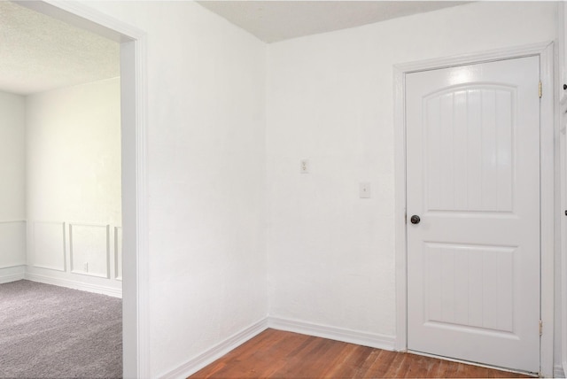 5524 Korth St, Sansom Park, TX 76114 - unfurnished room with dark wood-type flooring and baseboards
