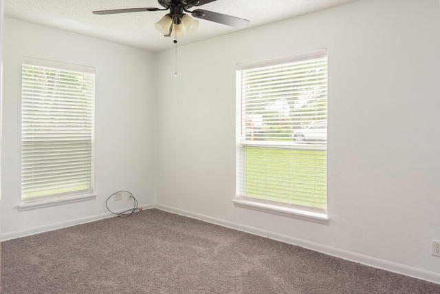 5524 Korth St, Sansom Park, TX 76114 - carpeted empty room featuring ceiling fan, healthy amount of natural light, and baseboards