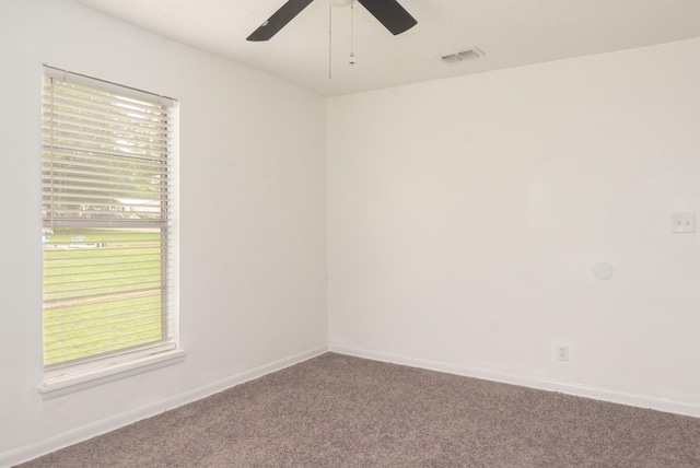 5524 Korth St, Sansom Park, TX 76114 - empty room with carpet flooring, a ceiling fan, and baseboards