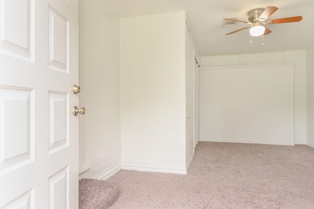 5524 Korth St, Sansom Park, TX 76114 - spare room featuring carpet flooring, a ceiling fan, and baseboards
