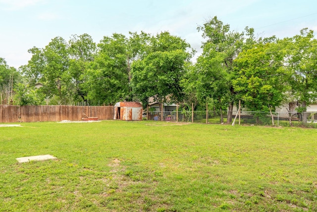 5524 Korth St, Sansom Park, TX 76114 - view of yard with a storage unit and an outbuilding