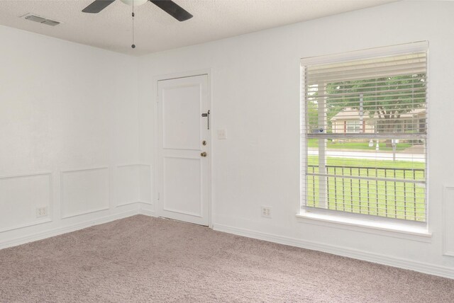 5524 Korth St, Sansom Park, TX 76114 - unfurnished room with carpet flooring, ceiling fan, and a textured ceiling