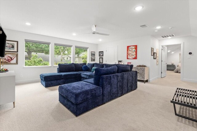 living room with recessed lighting, baseboards, visible vents, and light carpet