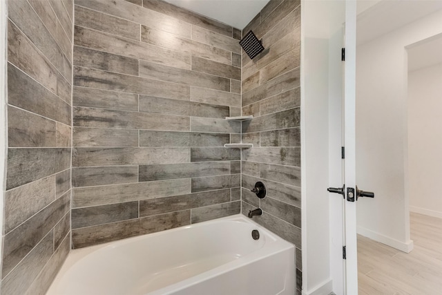 1130 Amsden Cir, Denison, TX 75020 - full bathroom with baseboards,  shower combination, and wood finished floors