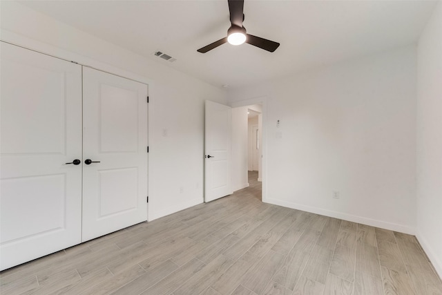 1130 Amsden Cir, Denison, TX 75020 - unfurnished bedroom featuring ceiling fan, visible vents, baseboards, a closet, and light wood-style floors