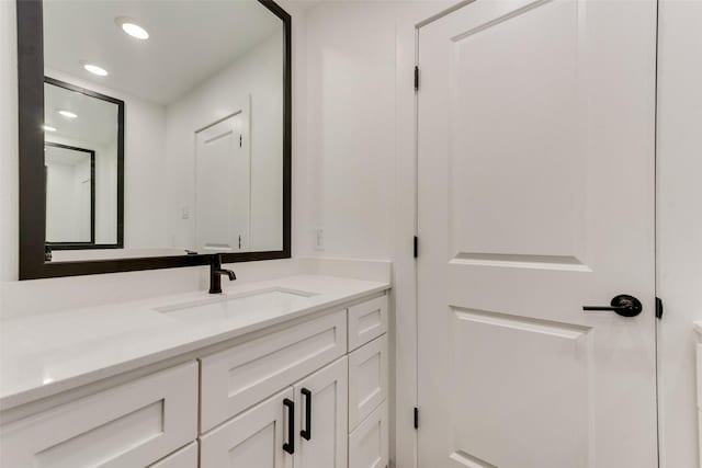 1130 Amsden Cir, Denison, TX 75020 - bathroom featuring vanity and recessed lighting