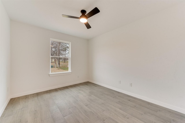 1130 Amsden Cir, Denison, TX 75020 - unfurnished room with ceiling fan, baseboards, and light wood-style floors
