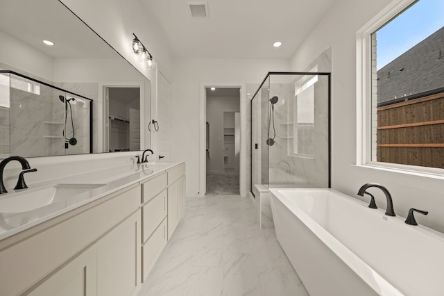 526 Windchase Dr, Haslet, TX 76052 - full bathroom featuring a shower stall, a walk in closet, marble finish floors, and recessed lighting