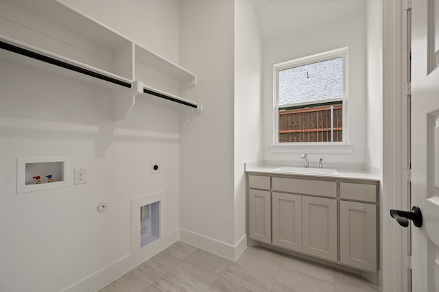 526 Windchase Dr, Haslet, TX 76052 - laundry room featuring electric dryer hookup, hookup for a gas dryer, baseboards, hookup for a washing machine, and cabinet space