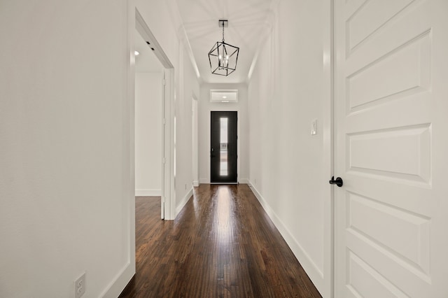 526 Windchase Dr, Haslet, TX 76052 - entrance foyer featuring dark wood finished floors, baseboards, and a chandelier