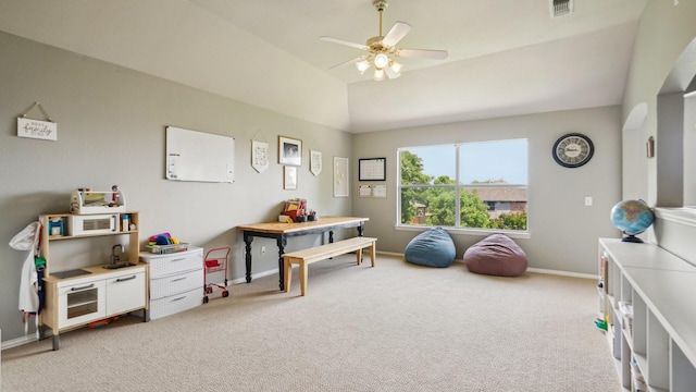 playroom with visible vents, baseboards, carpet floors, and ceiling fan
