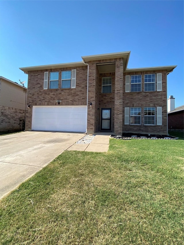 view of front facade featuring brick siding, driveway, a front lawn, and a garage