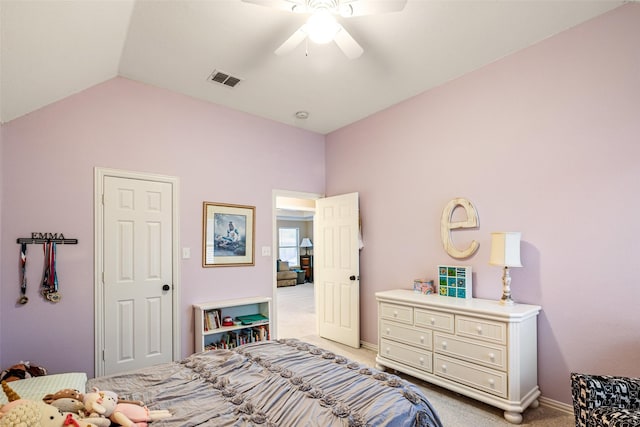 bedroom with light colored carpet, ceiling fan, vaulted ceiling, and visible vents