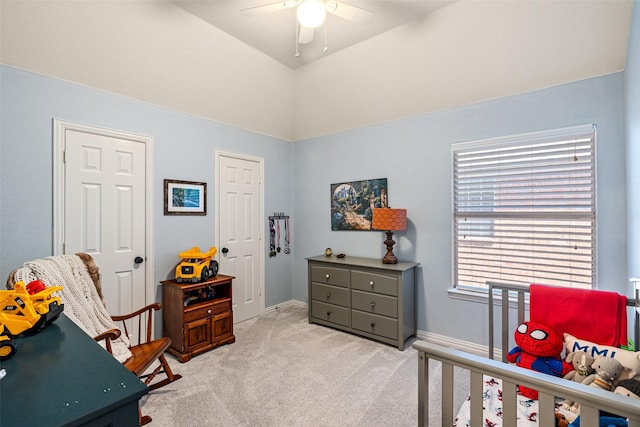 bedroom featuring carpet flooring, a ceiling fan, and baseboards
