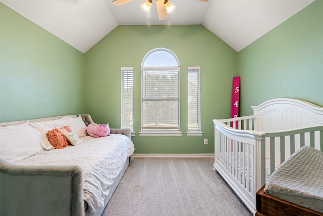 6017 Madera Ct, Plano, TX 75024 - carpeted bedroom featuring vaulted ceiling, baseboards, and a ceiling fan
