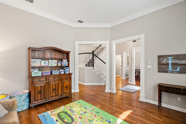 6017 Madera Ct, Plano, TX 75024 - playroom with wood finished floors, ornamental molding, and baseboards