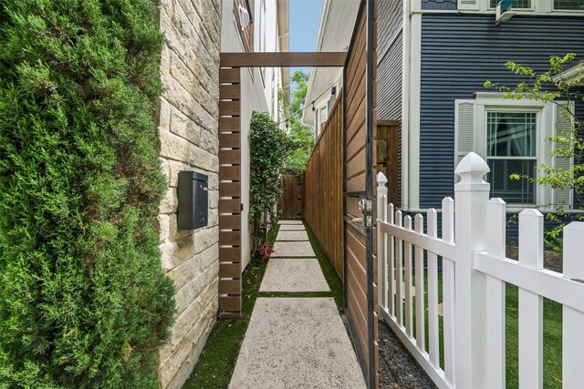 view of side of property with fence