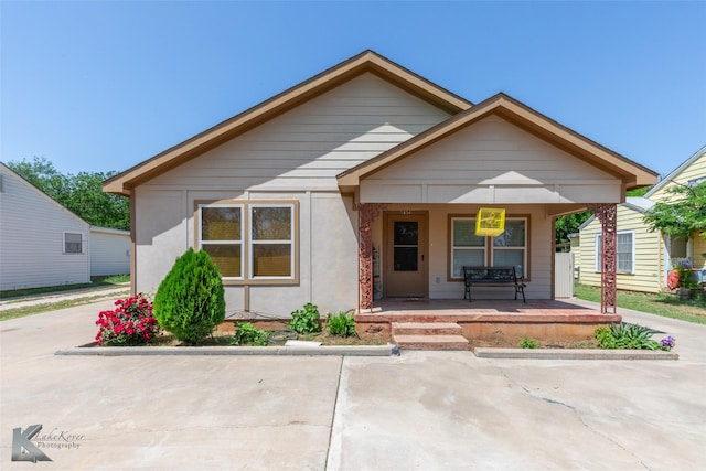 bungalow-style home featuring covered porch