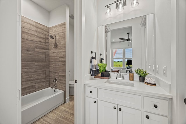 4771 Sasha Way, Caddo Mills, TX 75135 - full bath featuring ceiling fan, wood finished floors, vanity, toilet, and  shower combination
