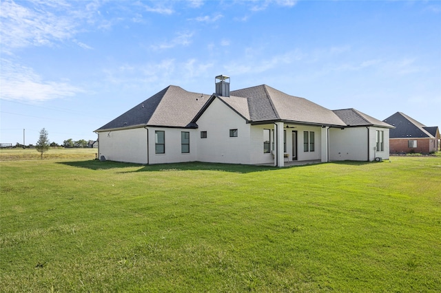4771 Sasha Way, Caddo Mills, TX 75135 - back of house featuring a shingled roof, a chimney, and a yard