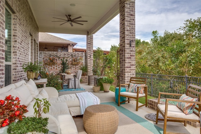 view of patio with ceiling fan and outdoor lounge area