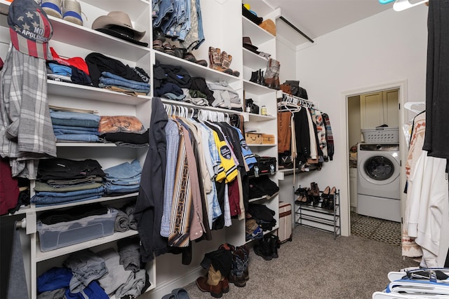 walk in closet featuring washer / dryer and carpet floors