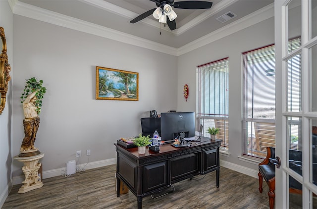 office featuring ceiling fan, baseboards, wood finished floors, visible vents, and ornamental molding