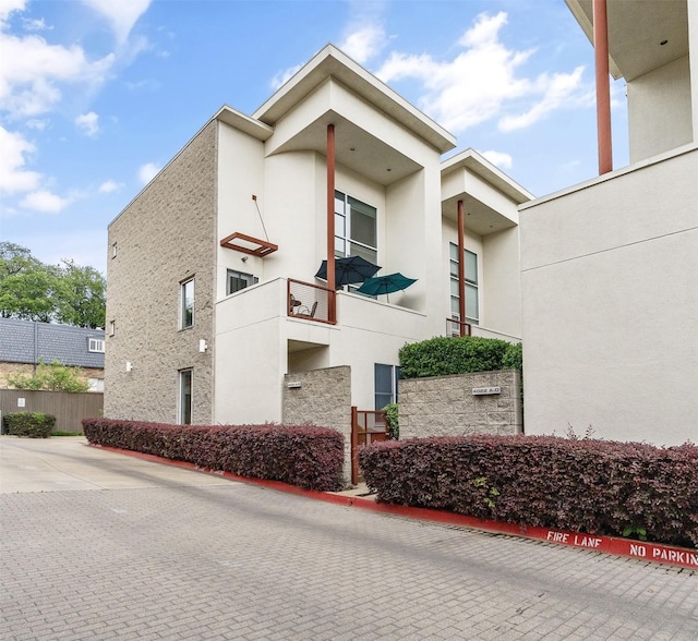 4030 Travis St Unit A, Dallas, TX 75204 - view of side of home with stucco siding