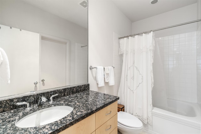 bathroom featuring vanity, shower / tub combo with curtain, toilet, and visible vents