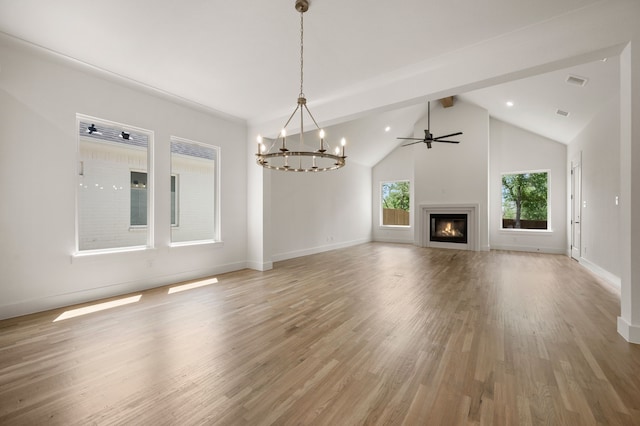 201 Kingfisher Ct, Aledo, TX 76008 - unfurnished living room featuring light wood-style flooring, a glass covered fireplace, a chandelier, baseboards, and a ceiling fan