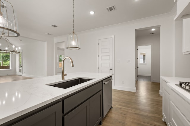 201 Kingfisher Ct, Aledo, TX 76008 - kitchen with a sink, stainless steel appliances, light wood-style flooring, pendant lighting, and light stone counters