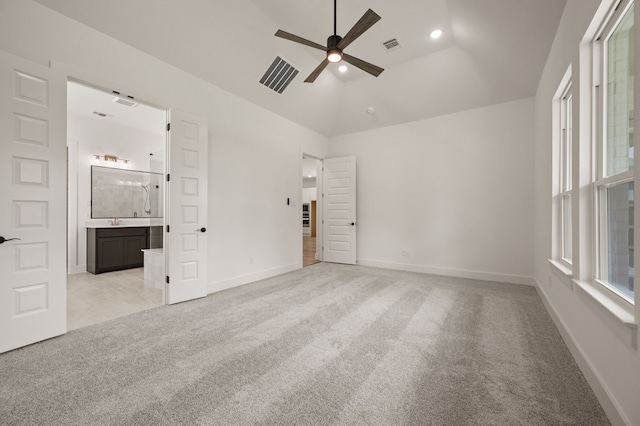 201 Kingfisher Ct, Aledo, TX 76008 - unfurnished bedroom with light colored carpet, baseboards, vaulted ceiling, ensuite bathroom, and recessed lighting