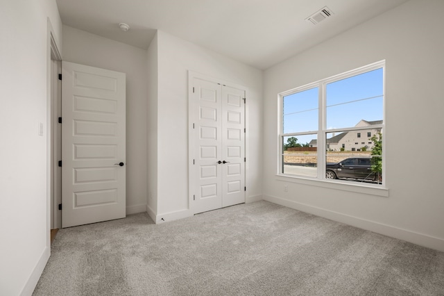 201 Kingfisher Ct, Aledo, TX 76008 - unfurnished bedroom with carpet flooring, baseboards, and a closet