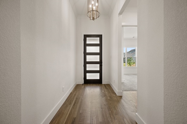 201 Kingfisher Ct, Aledo, TX 76008 - entrance foyer featuring a chandelier, dark wood-style flooring, baseboards, and a textured wall