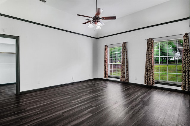 unfurnished room featuring a healthy amount of sunlight, a ceiling fan, and wood finished floors