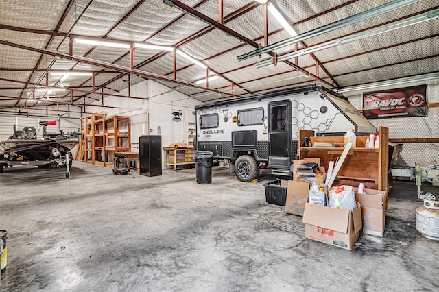 garage with a workshop area