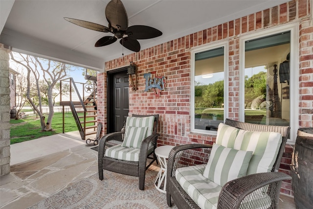 view of patio featuring a ceiling fan