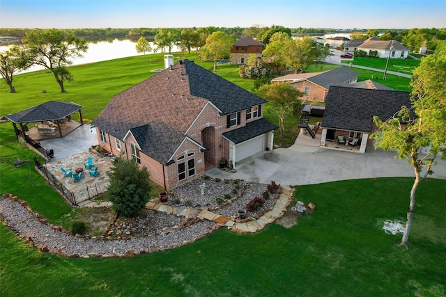 drone / aerial view featuring a water view