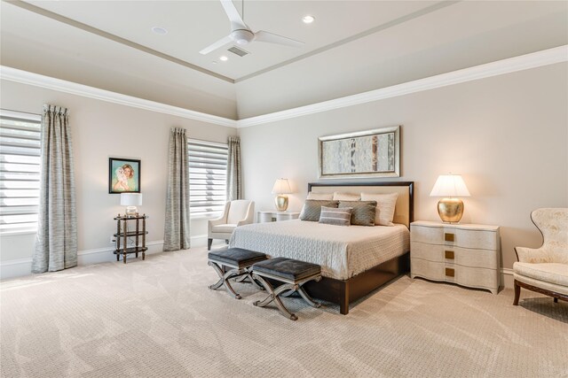 carpeted bedroom featuring crown molding, a ceiling fan, and baseboards