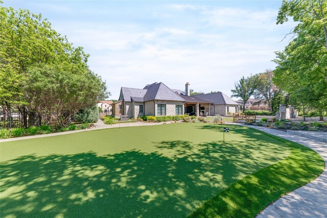 view of front of home with fence