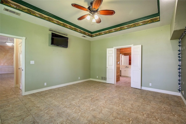 2160 W Fm 550, Mclendon Chisholm, TX 75032 - empty room featuring a ceiling fan, a raised ceiling, baseboards, and a sink
