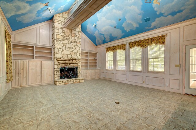 2160 W Fm 550, Mclendon Chisholm, TX 75032 - unfurnished living room featuring built in features, a decorative wall, a stone fireplace, and high vaulted ceiling