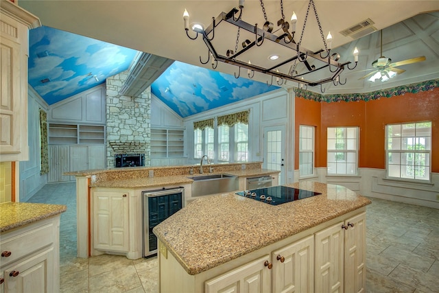 2160 W Fm 550, Mclendon Chisholm, TX 75032 - kitchen featuring wine cooler, a sink, black electric stovetop, a center island, and a chandelier